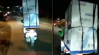 Viral Video Driver Ojol Bawa Mesin Cuci dengan Motor, Netizen.....