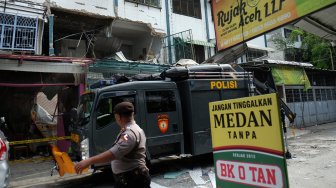 Lokasi ledakan gas di rumah toko, Jalan Kruing, Medan, Sumatera Utara, Jumat (12/4). [ANTARA FOTO/Irsan Mulyadi]