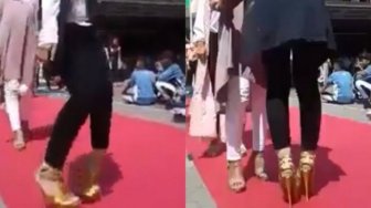 Tak Biasa Gunakan Sepatu High Heels, Perempuan Ini Ambruk Saat Fashion Show