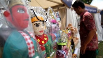 Suasana Festival Warisan Budaya Tak Benda di Kawasan Setu Babakan, Jakarta, Jumat (26/4). [Suara.com/Arief Hermawan P]