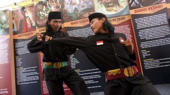 Suasana Festival Warisan Budaya Tak Benda di Kawasan Setu Babakan, Jakarta, Jumat (26/4). [Suara.com/Arief Hermawan P]