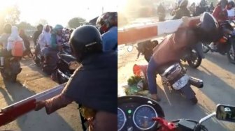 Seperti Ini Jadinya Jika Seorang Emak-Emak Terobos Palang Kereta Api