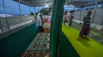 Suasana di Musala Kamp Pengungsi Balaroa, Palu, Sulawesi Tengah, Selasa (14/5). [ANTARA FOTO/Basri Marzuki]