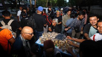 Suasana acara buka puasa bersama Pewarta Foto Indonesia Jakarta di kawasan Bundaran HI, Jakarta, Jumat (18/5). [Foto/Dok PFIJ]