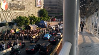 Suasana di Jalan MH Thamrin, Jakarta, Selasa (28/5). [Suara.com/Oke Atmaja]