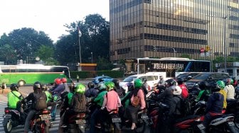 Suasana di Jalan MH Thamrin, Jakarta, Selasa (28/5). [Suara.com/Oke Atmaja]