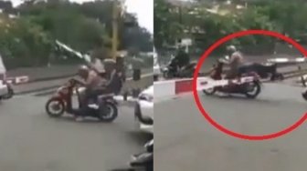 Akibat Terlalu Nekat Terobos Palang Kereta Api, Kepala Pun Jadi Puyeng