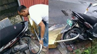 Biar nggak Gampang Hilang, Pria Ini Beri Pengamanan Totalitas Pada Motornya