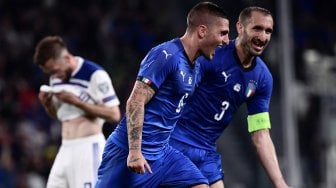 Gelandang Italia Marco Verratti merayakan golnya setelah mencetak gol ke gawang Bosnia selama pertandingan sepak bola kualifikasi UEFA Euro 2020 antara Italia melawan Bosnia Herzegovina di Stadion Allianz, Turin, Italia, Rabu (12/6) dini hari WIB. [MARCO BERTORELLO / AFP]