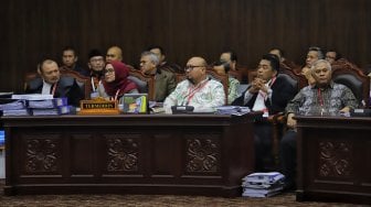 Saksi Ahli pihak KPU Prof Dr Ir Marsudi Wahyu Kisworo memberi keterangan saat sidang sengketa hasil pilpres yang digelar di Mahkamah Konstitusi, Kamis (20/6).[Suara.com/Muhaimin A Untung]