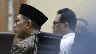 Menteri Agama Lukman Hakim Saifuddin saat bersaksi di Pengadilan Tindak Pidana Korupsi (Tipikor), Jakarta, Rabu (26/6). [Suara.com/Arief Hermawan P]