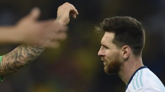 Ekspresi Lionel Messi usai Argentina dikalahkan Brasil saat Pertandingan semifinal Copa America antara Brasil melawan Argentina di Stadion Estadio Mineirao, Brasil, Rabu (3/7). [Douglas Magno / AFP]