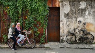 Hasil Muralnya Viral Jadi Atraksi Wisata, Seniman Ini Malah Menyesal