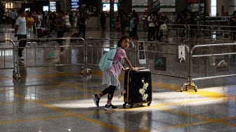 Suasana di Bandara Internasional Hong Kong, Cina, Selasa (13/8). [Philip FONG / AFP]
