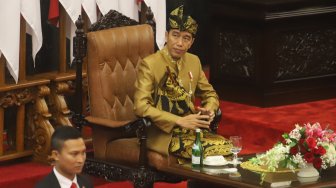 Presiden Joko Widodo saat menghadiri  sidang bersama DPD-DPR di Kompleks Parlemen, Jakarta, Jumat (16/8). [Suara.com/Arya Manggala]
