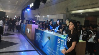 Suasana Booth Stig pada acara "Vape Fair" di JCC, Jakarta, Sabtu (7/9). (Suara.com/Angga Budhiyanto)