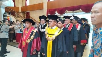 Menkumham Yasonna Laoly Resmi Dikukuhkan Jadi Guru Besar PTIK