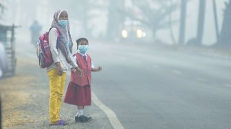 Sempat Diguyur Hujan, Kabut Asap Tebal Kembali Selimuti Kota Jambi