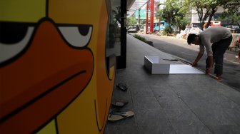 Suasana di kawasan M Bloc Space, Blok M, Jakarta, Rabu (9/10). [Suara.com/Angga Budhiyanto]