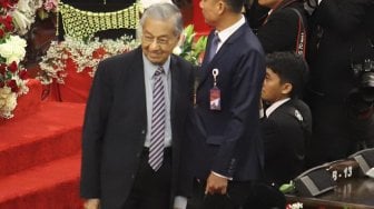 PM Malaysia Mahathir Mohamad  saat menghadiri pelantikan presiden dan wakil presiden di Kompleks Parlemen, Jakarta, Minggu (20/10). [Suara.com/Arya Manggala] 