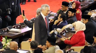 Perdana Menteri Singapura Lee Hsien Loong saat menghadiri pelantikan presiden dan wakil presiden di Kompleks Parlemen, Jakarta, Minggu (20/10). [Suara.com/Arya Manggala]    