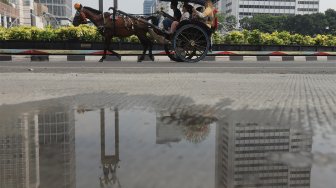 Suasana di kawasan Budaran Hotel Indonesia, Jakarta, Minggu (20/10). [Suara.com/Angga Budhiyanto]