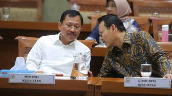 Menteri Kesehatan Terawan Agus Putranto dan Direktur Utama BPJS Kesehatan Fachmi Idris saat menghadiri Rapat Dengar Pendapat di Komisi IX DPR, Kompleks Parlemen, Jakarta, Selasa (5/11). [Suara.com/Arya Manggala]