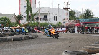 Honda Dream Cup (HDC) seri Samarinda digelar di Sirkuit Ex Bandara Temindung, Kota Samarinda, Kalimantan Timur, Minggu (10/11/2019). [Suara.com/Syaiful Rachman]