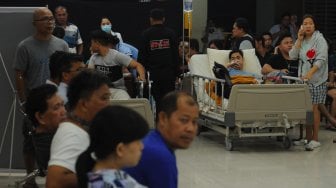 Suasana saat terjadi gempa di Manado, Sulawesi Utara, Kamis (14/11). [ANTARA FOTO/Aloysius Jarot Nugroho]