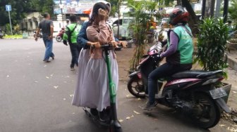 Jakarta Larang Grabwheels di Trotoar, Grab Mendukung