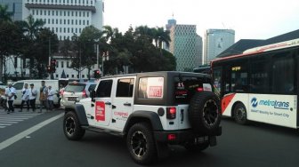 Mobil Jeep Berstiker Dukung Novel Baswedan Muncul di Acara Reuni 212