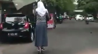 Berboncengan Tanpa Helm Naik Grabwheels di Jalan Raya, Video ABG Ini Viral