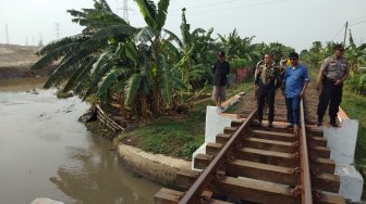 Kali Permukiman dan Sawah di Lingkungan Kruwuk Cilegon Terendam Banjir 