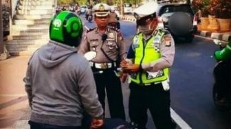 Ramai Ojol Tertilang saat Turunkan Penumpang di Jalur Khusus Sepeda, Regulasi Perlu Dikaji Ulang?