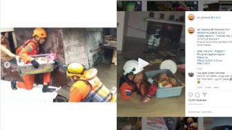 Viral Video Evakuasi Bayi saat Banjir, Tim SAR Didoakan