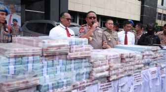 Polisi Tangkap Pelaku dan Sita Ratusan Miliar Investasi Bodong Memiles