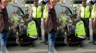 Bantu Ganti Ban di Jalan, Polisi di Jogja Ini Viral