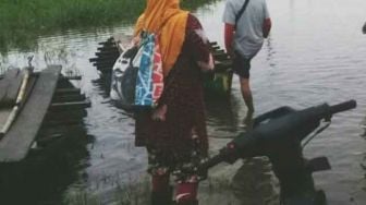 Jalan di Desa Jebus Muaro Jambi Terendam Banjir