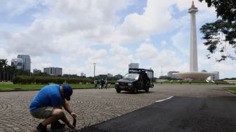 Persiapan Lintasan Balap Formula E, Sebagian Cobblestone Monas Diaspal