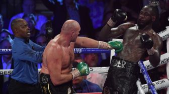 Wilder Babak Belur Hadapi Fury, Legenda Tinju: Kau Tetap Pemenang di Mataku