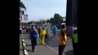 Kendaraan Keluar Jogja Disemprot Desinfektan, Corona Ketawa dari Mobil