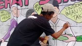 Lewat Mural Dinding Cara Seniman Lebak Ajak Masyarakat Lawan Corona