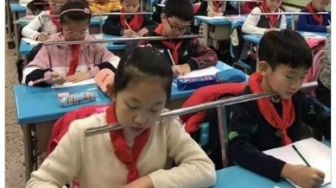 China Larang PR dan Ujian Tertulis untuk Murid Kelas 1 dan 2 SD