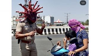 Unik! Ini Cara Polisi India Edukasi Soal Covid-19, Perhatikan Helmnya