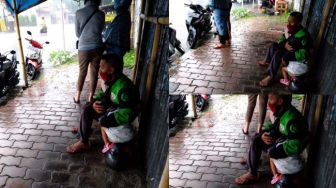 Viral Ojol Kehujanan Peluk Anak, Sosoknya Viral hingga Dicari Kapolres