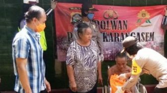 Kapolres Karangasem Berbagi Tali Kasih Bersama Warga Terdampak Corona