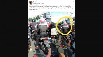 Viral Pengendara Motor Berlapis Plastik, Warganet: Demi Lawan Corona!