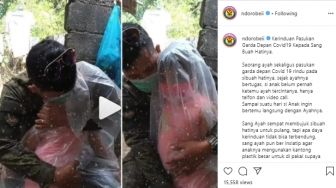 Viral Foto Petugas COVID-19 Peluk Anak Dibungkus Plastik, 'Ayah Kangen Dek'