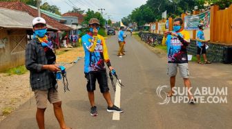 Goweser Waluran Sukabumi Ikut Cegah Corona dengan Sebar Masker