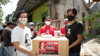 Gibran Bersama Relawan Salurkan Bantuan Ribuan Masker dari Ketua DPR